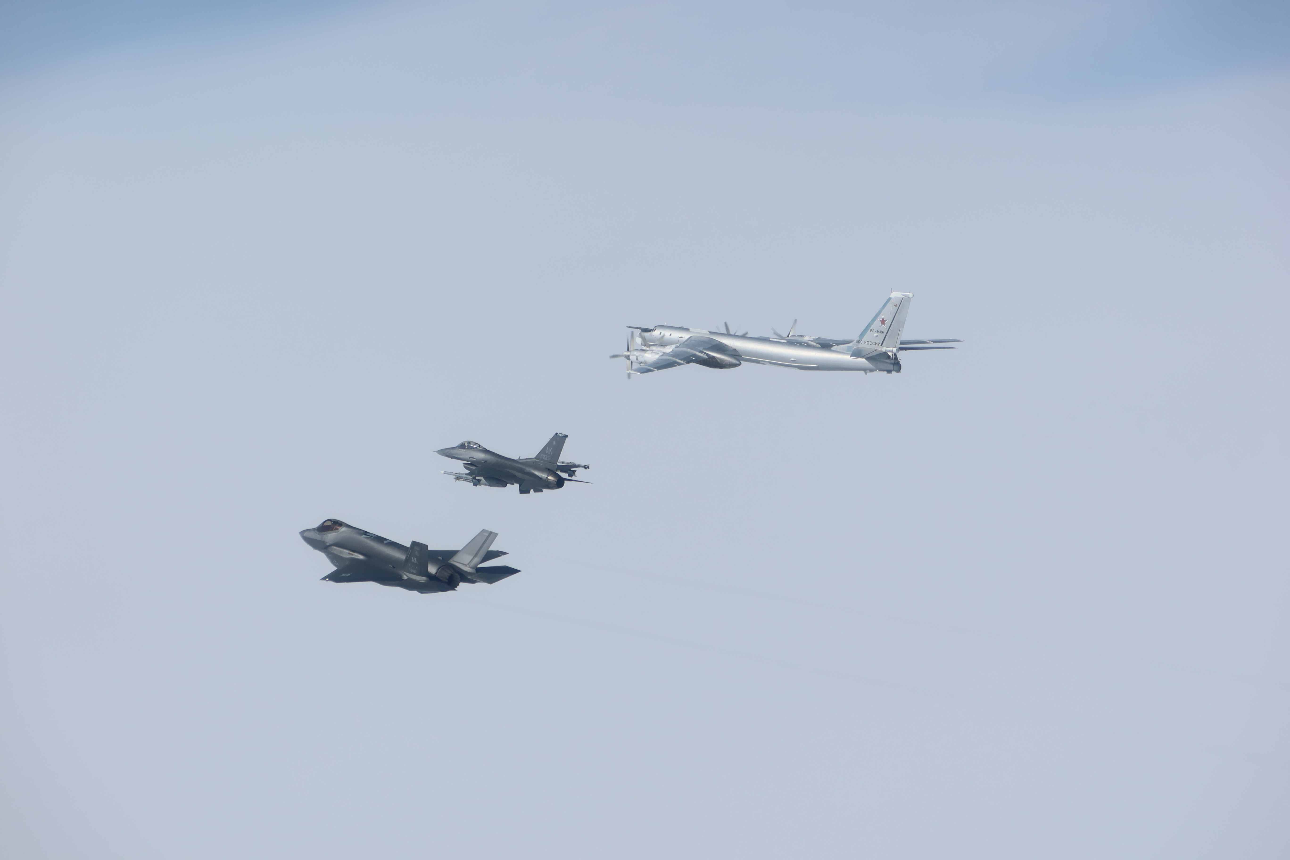 NORAD jet plane forces intercepting a Russia Tupolev Tu-95 "Bear" bomber. NORAD jet plane forces intercepting a Russia Tupolev Tu-95 "Bear" bomber.