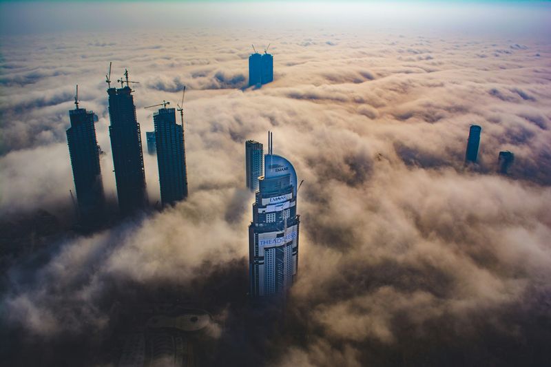 Clouds over the skyscraper skyline of Dubai in the UAE, pictured from the Burj Khalifa, the tallest building in the world.