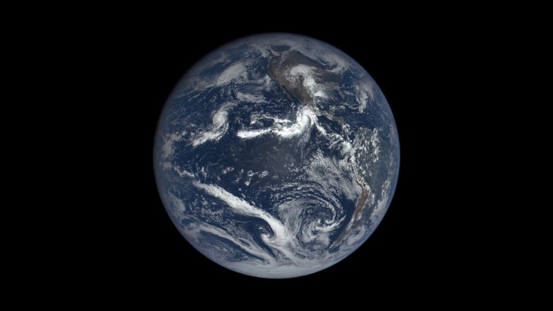 An image of the Earth's globe focusing on the Americas and the pacific showing a A hurricane like storm near mexico