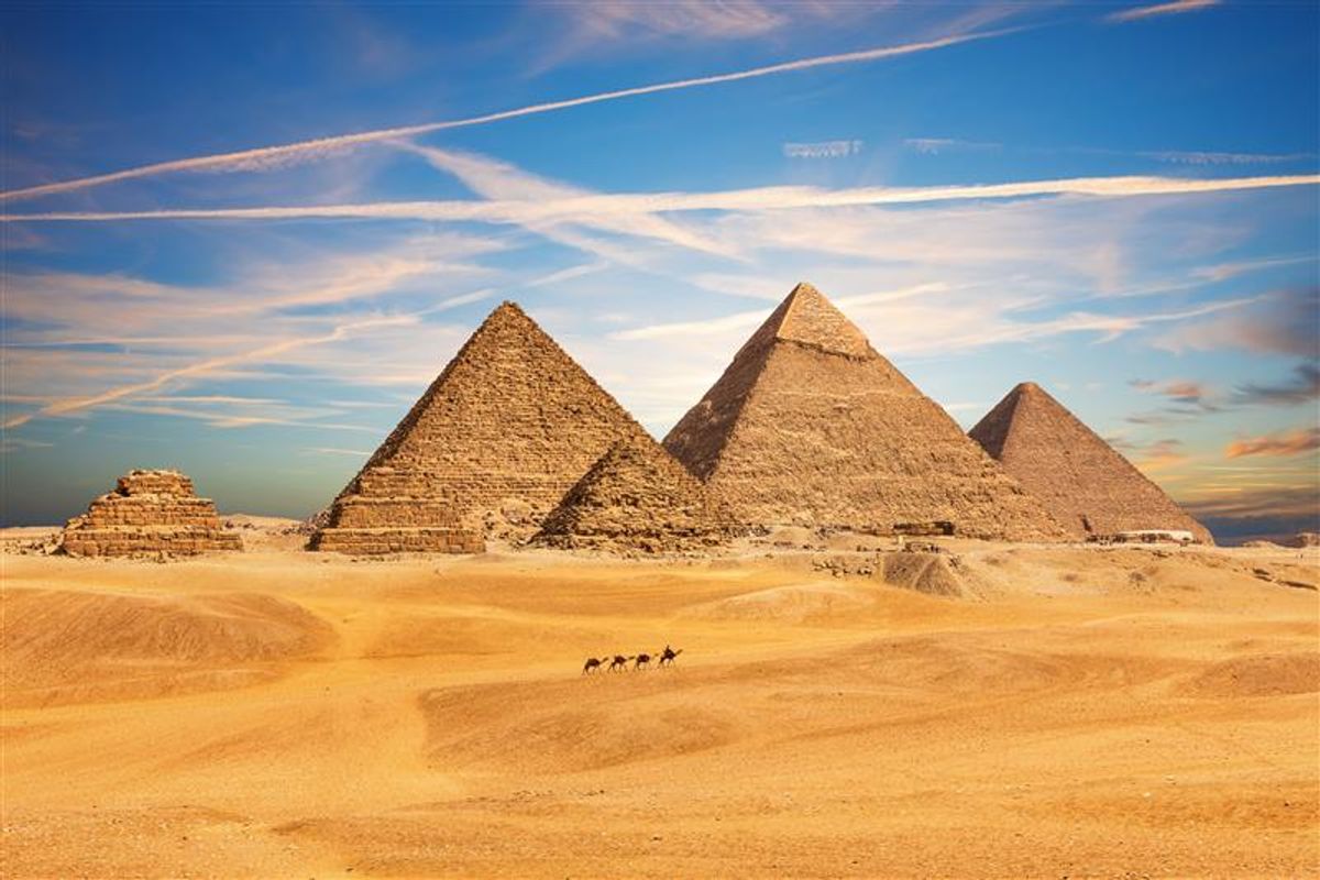the complex of giza seeing during the day. The three main pyramids and the smaller ones are all visible