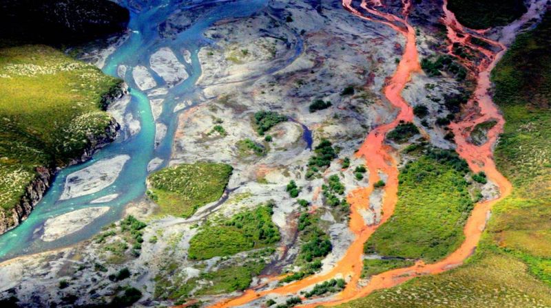 An aerial view of the rust-colored Kutuk River in Gates of the Arctic National Park in Alaska. 