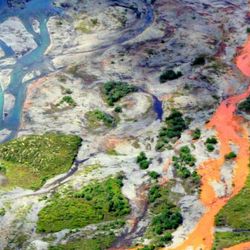 An aerial view of the rust-colored Kutuk River in Gates of the Arctic National Park in Alaska. 