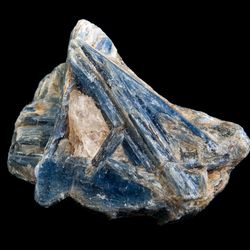 Kyanite crystal specimen isolated on a black background