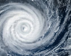 Swirling hurricane over the ocean seen from above
