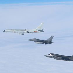NORAD shared this image of North American fighter jets with a Chinese Xi'an H-6 bomber.