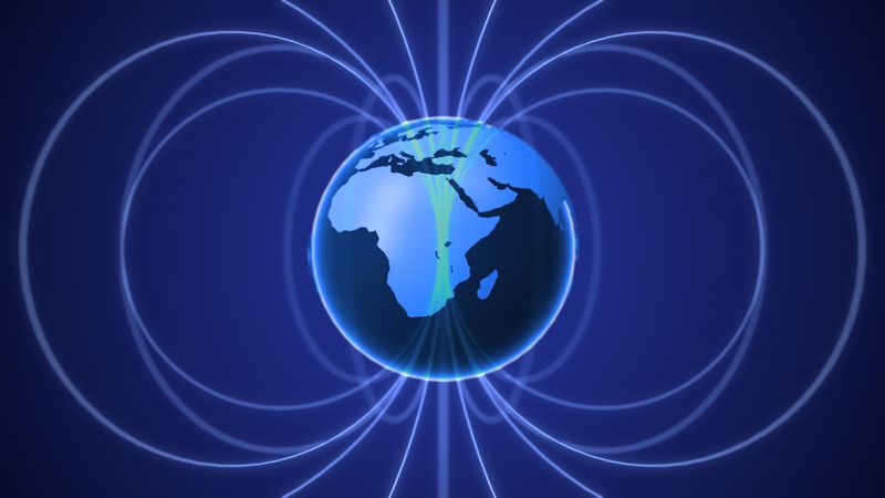 A schematic view of the Earth's magnetic field as conventri rings going from one pole to the next