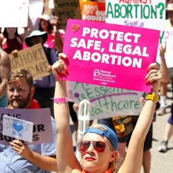 pro-choice protestors holding signs with slogans such as "protect safe, legal abortion" in Austin, Texas, photographed May 14, 2022