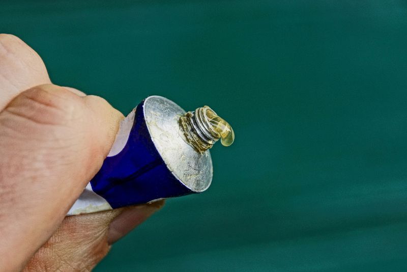 Tube of superglue being squeezed