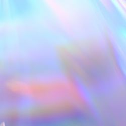 A photo of a holographic plastic creating many rainbows