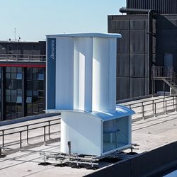 motionless wind turbine on the roof of Plant Oxford