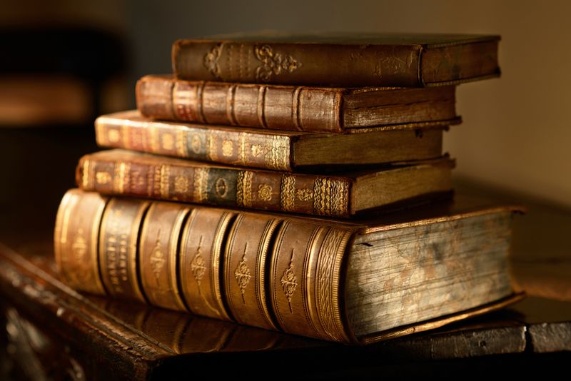 stack of antiquarian books