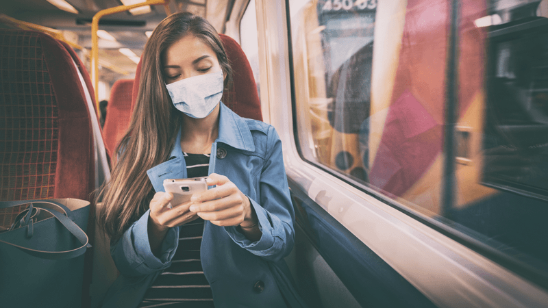 woman wearing mask on a train