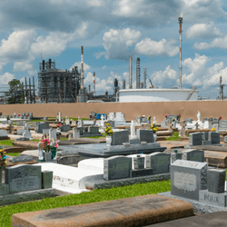 A petrochemical plant over looks a cemetery in Taft, Louisiana.