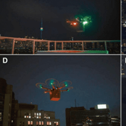 A drone modified specifically for lung transport A) test flight, (B) takeoff from Toronto Western Hospital, (C) mid-flight over Toronto, (D) landing approach, and (E) landing at Toronto General Hospital