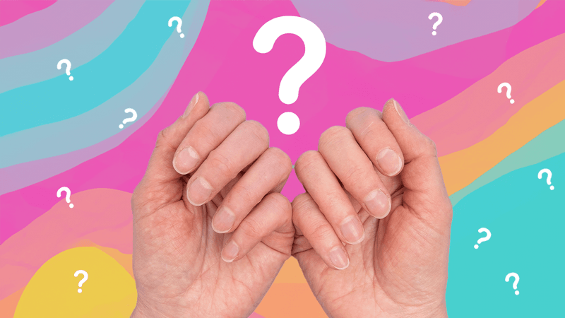 a pair of hands with the nails visible, on a colorful background with white question marks