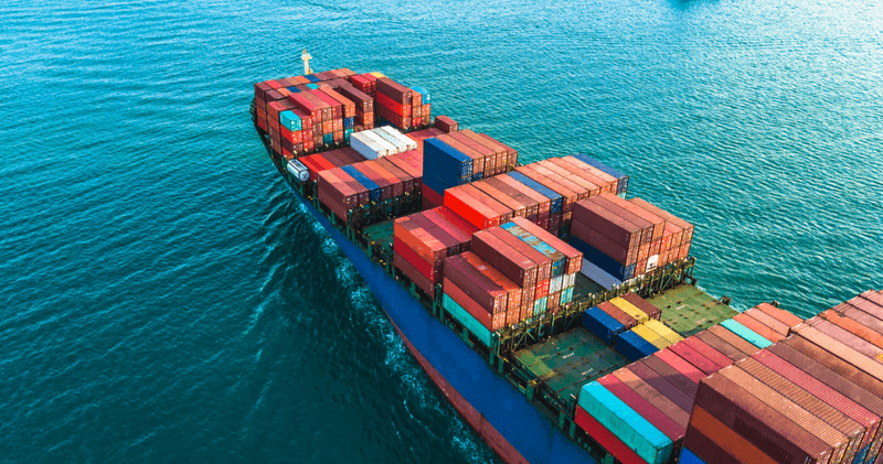 Aerial view container cargo ship, import export commerce business trade logistic and transportation of International by container cargo ship boat in the open sea, Freight shipping maritime.