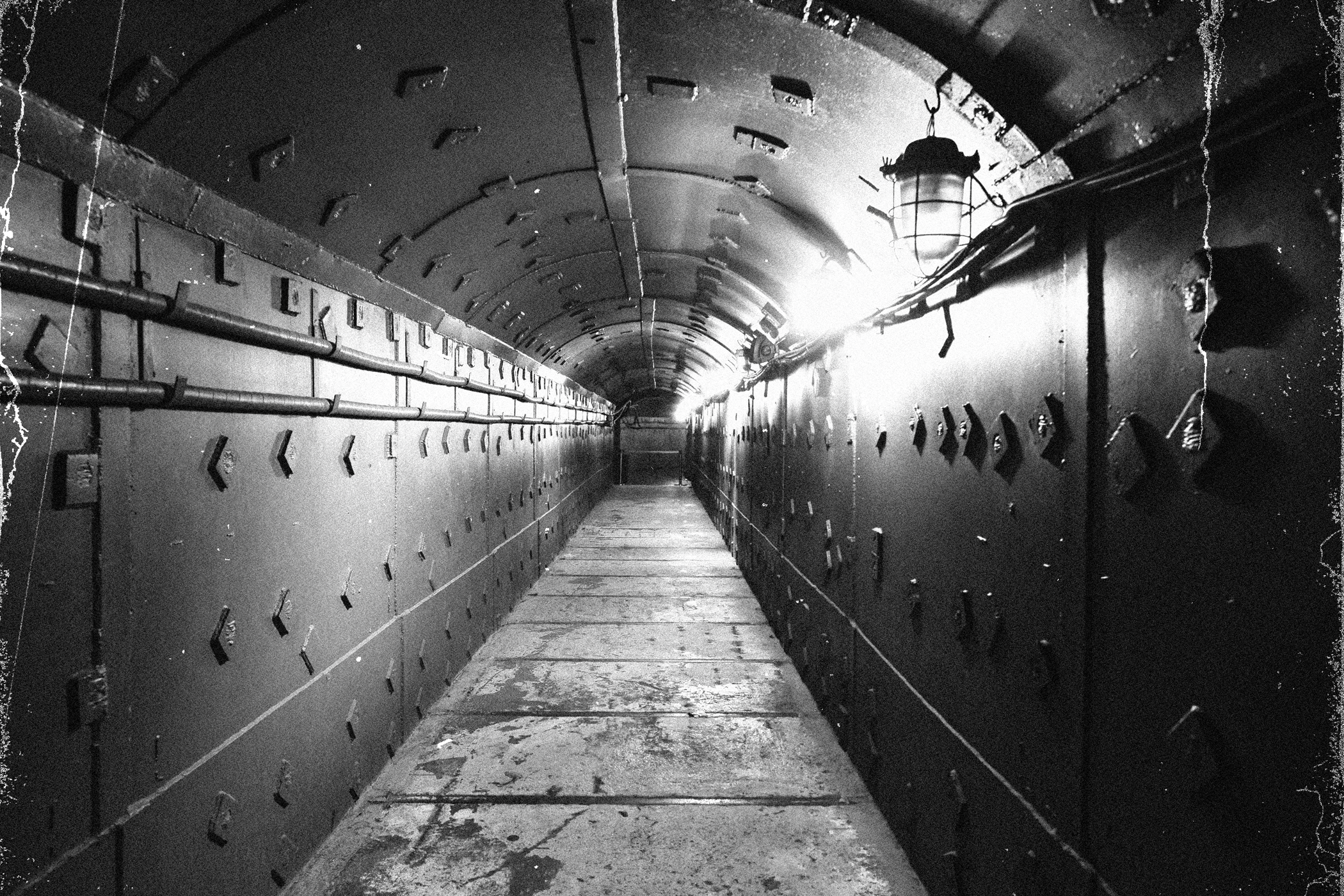 A black and white photo of an underground bunker illustrating the urban legend of the Russian Sleep Experiment A black and white photo of an underground bunker illustrating the urban legend of the Russian Sleep Experiment